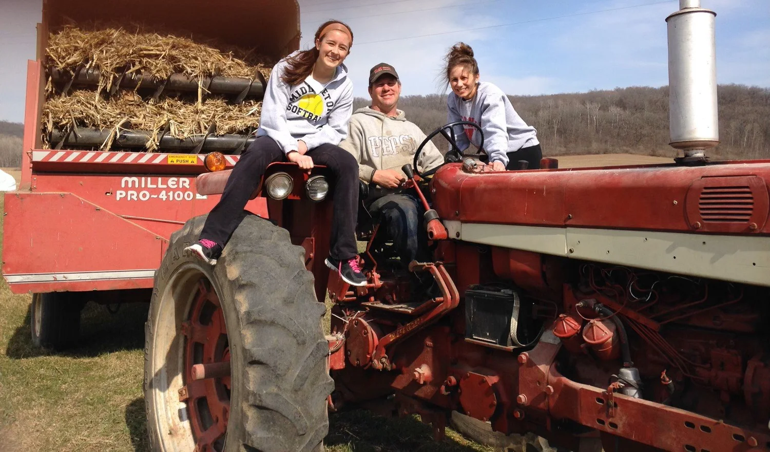 Volunteers helping with chores at Nonn Family Farm